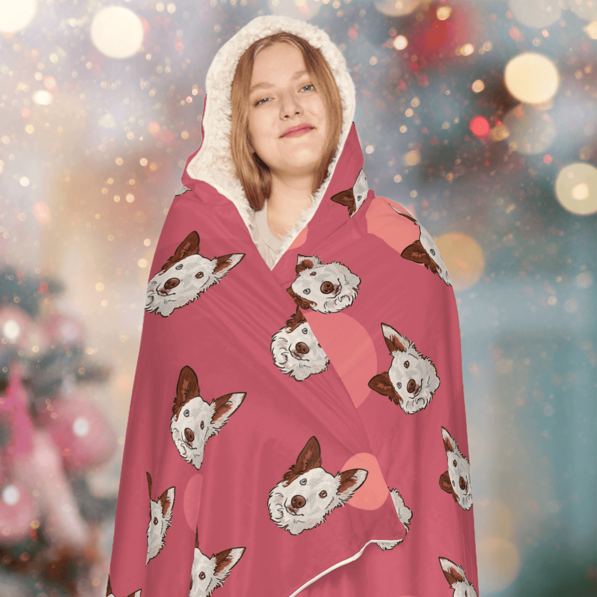 Cozy woman in comfortable loungewear blanket with dog prints, enjoying a festive atmosphere.
